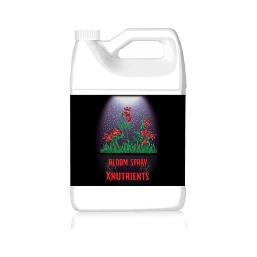 X-Nutrients Bloom Spray bottle with red flowers, green grass, and water droplets.