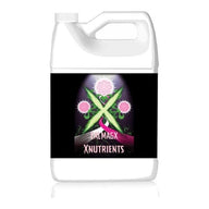 White gallon jug of X-Nutrients CalMag with pink flower graphics.